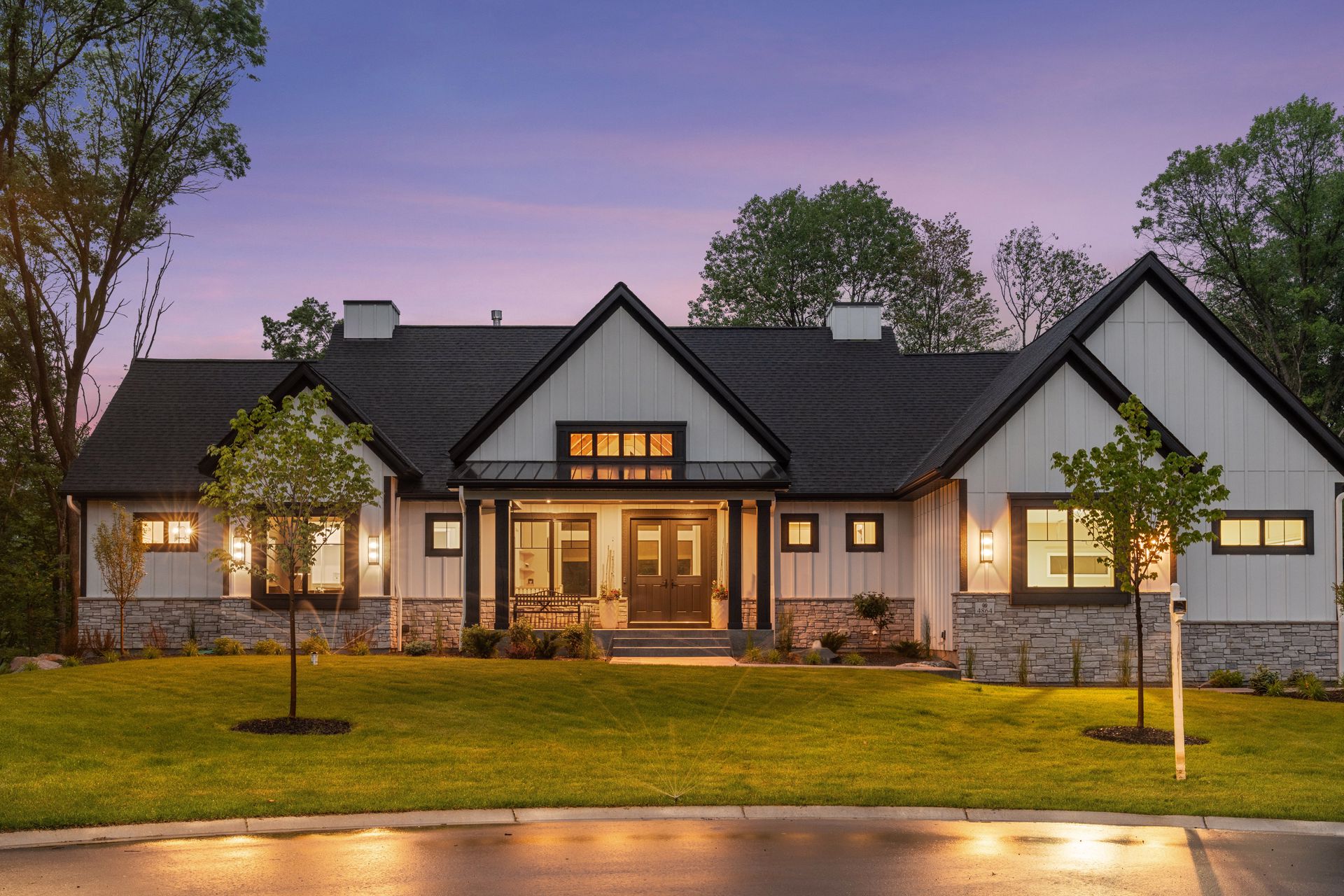 Home beautifully illuminated at dusk